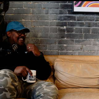 Corey Dion Lewis, host of The Healthy Project Podcast.